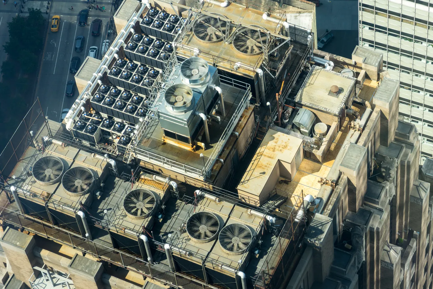Aerial view of rooftop cooling equipment on a commercial building