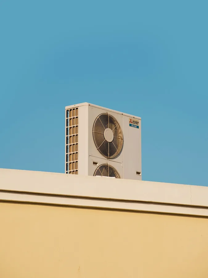 Mitsubishi Electric outdoor condenser representative of the Hotel Jayamahal split installation