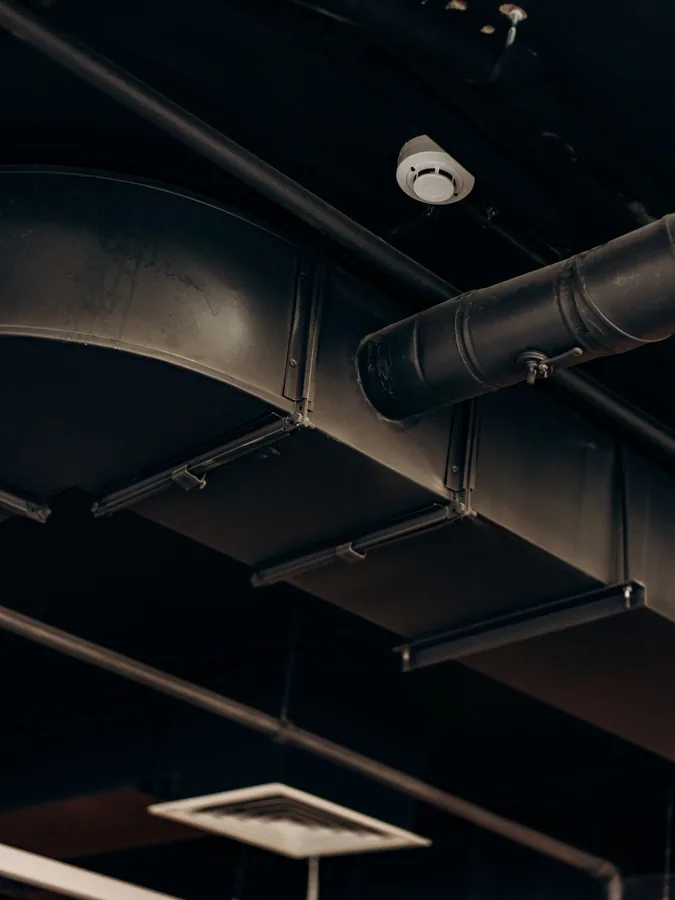 Concealed ductable AC system installed in a commercial ceiling