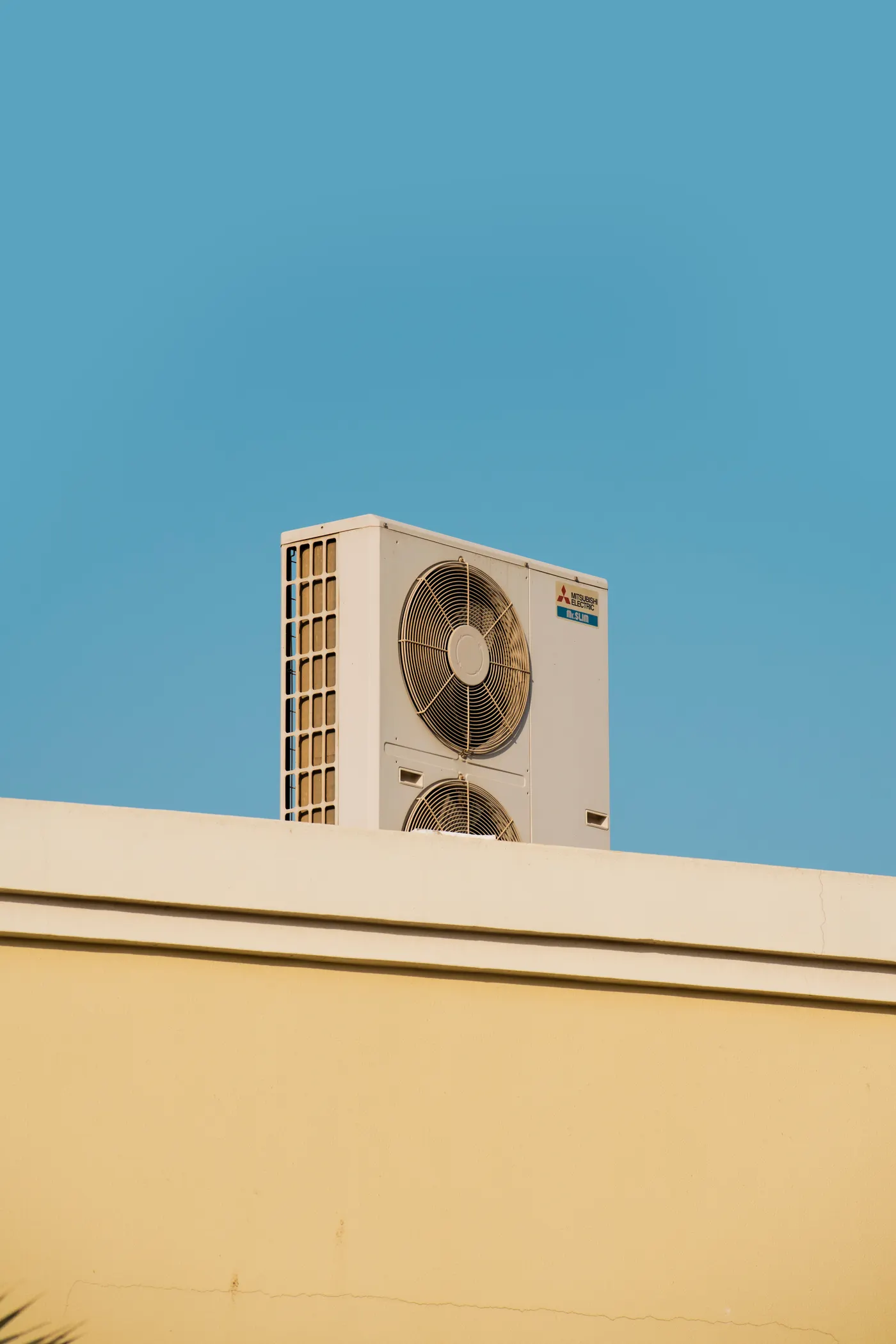 Mitsubishi Electric outdoor VRF unit installed on a rooftop