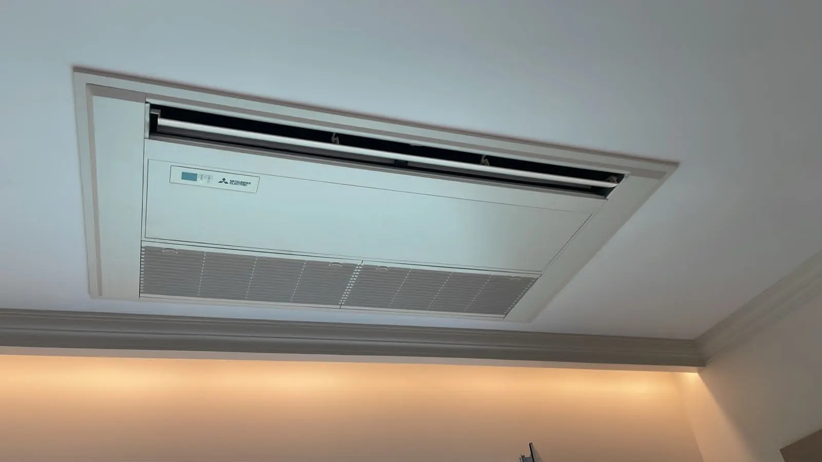 Ceiling cassette and ductable AC units concealed within a commercial false ceiling