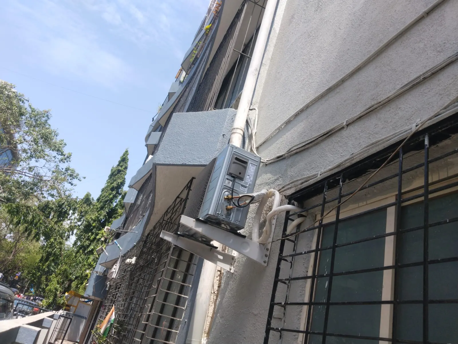 Outdoor VRV condenser units installed on a commercial building facade