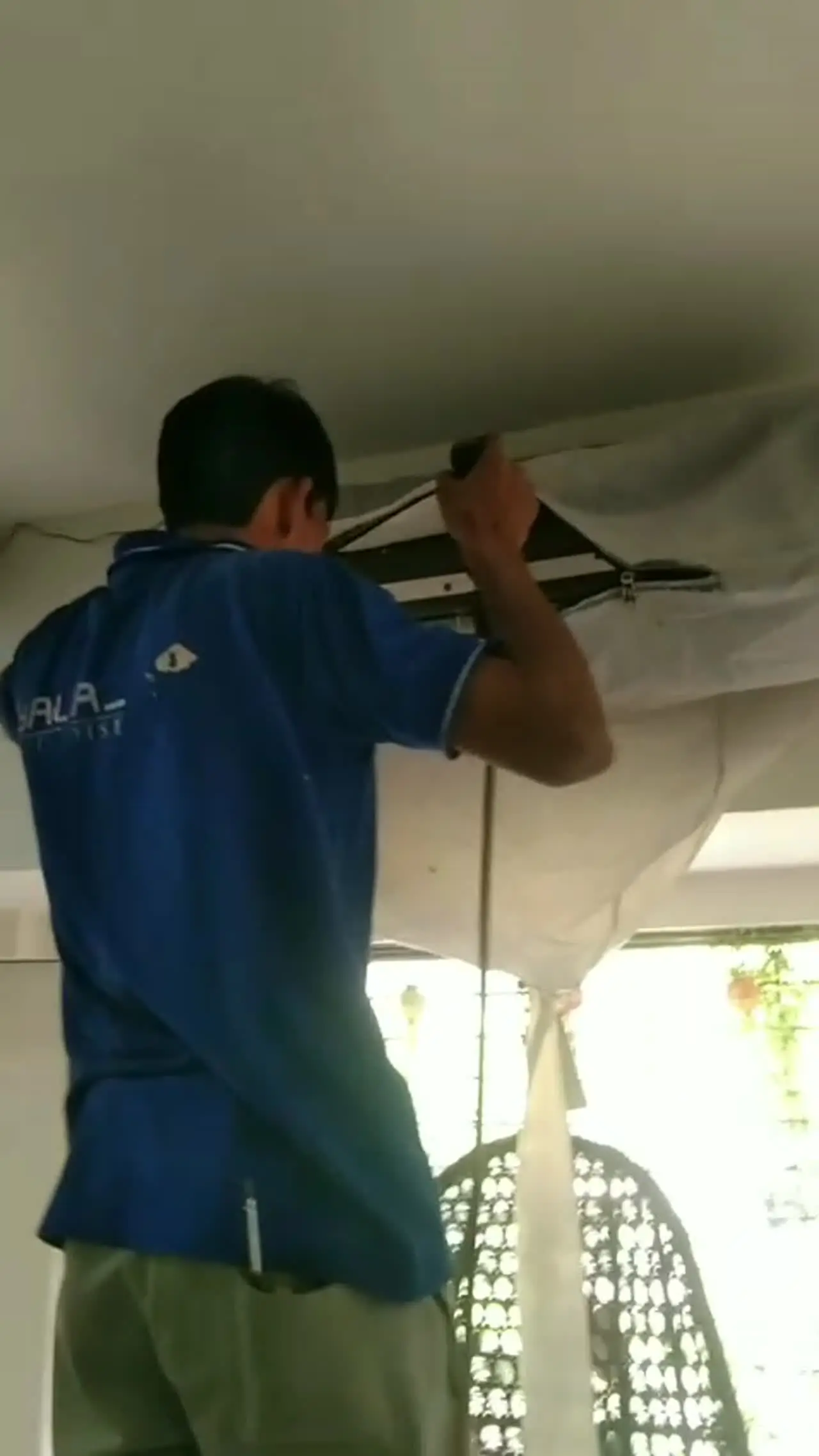 Play video: Balaji Enterprises technician installing an indoor split AC unit